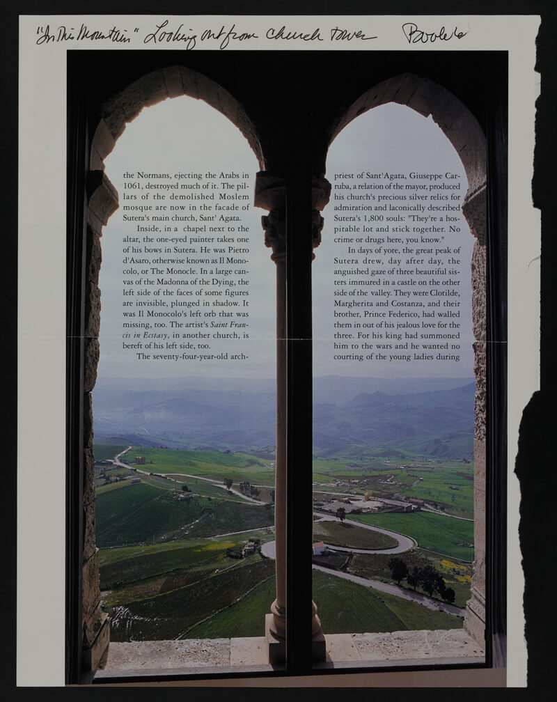 View through stone window to hilly green lands below, with curving roads. Note says: In this Mountain looking out from church tower