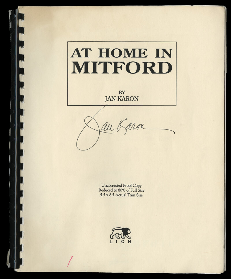 Bound volume 'At Home in Mitford', signed. Lion logo.